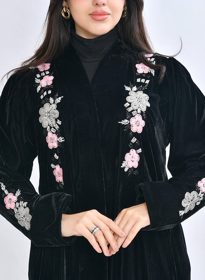 HAWRAA ABAYA Blossom abaya crafted from soft black velvet fabric, adorned with refined hand embroidery featuring delicate embellishments and floral motifs - Image 3